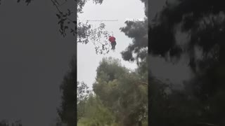 Crews rescue CA man clinging to tree from fast-rising floodwaters