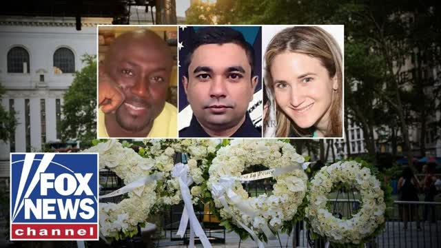 TEARS AND QUESTIONS: New York grieves as gunman's motive in deadly shooting remain unclear