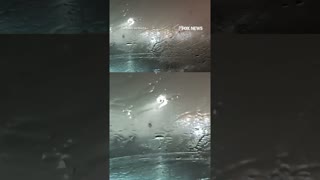 Father and son caught in car as tornado tears through gas station