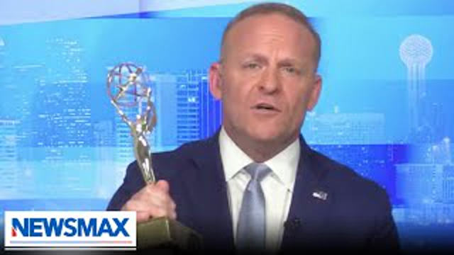 Grant Stinchfield awards this Senator with an Emmy