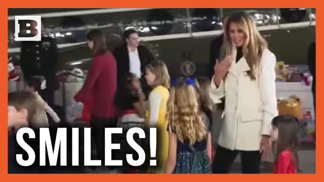 All Smiles! Melania Takes Pictures With Military Children at Toys for Tots Event