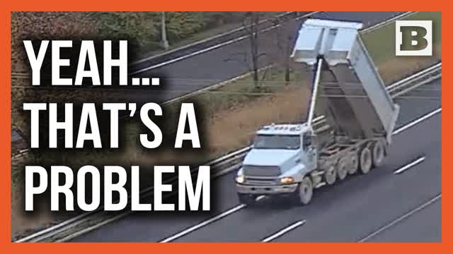 Dump Truck Takes Down Highway Sign After Driving With Bed Raised