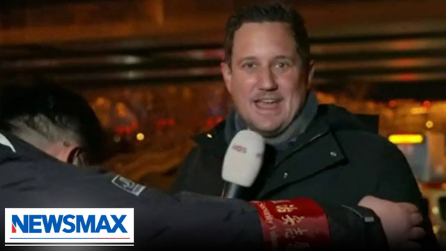 Journalist pulled off air during Beijing report | REACTION | 'American Agenda'
