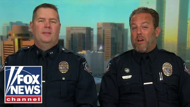 Police officers give turkeys, not tickets, for Thanksgiving