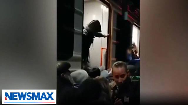 VIDEO: Desperate locals scramble for trains out of Ukraine | 'John Bachman Now'