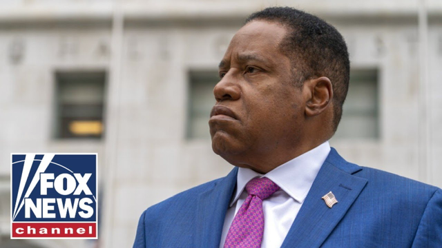 Woman in gorilla mask throws eggs at Larry Elder