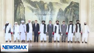 Why is China meeting with the Taliban? | REACTION