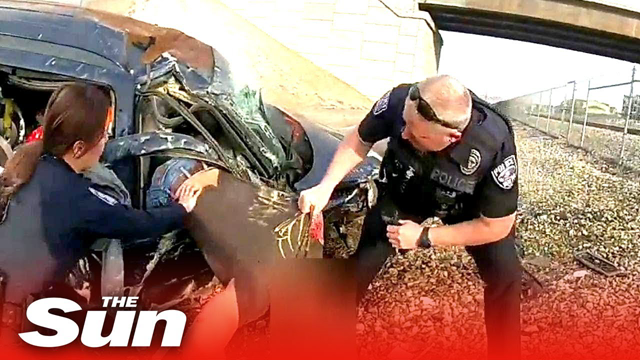 Police pull fleeing suspect from burning car after it drives off Utah overpass