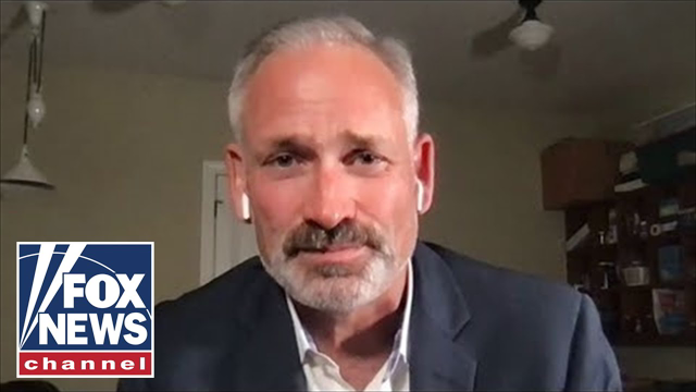 Man arrested at chaotic school board meeting speaks out